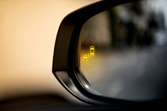 Why Isn't Blind Spot Warning Standard on Every Car?
